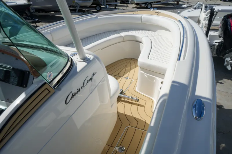 Slide: The Image of 2008 Chris-Craft Catalina 26 boat with elegant seating and sleek design. - 19