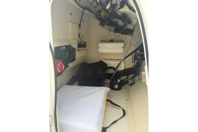 Slide: The Image of Interior view of a 2021 Boston Whaler 190 Montauk boat's storage compartment. - 7
