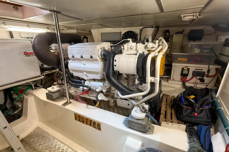 Slide: The Image of Engine room of 2008 Grand Banks 45 Eastbay SX with CAT marine power engine. - 55