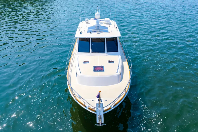 Slide: The Image of 2008 Grand Banks 45 Eastbay SX yacht on calm blue water, aerial view. - 63