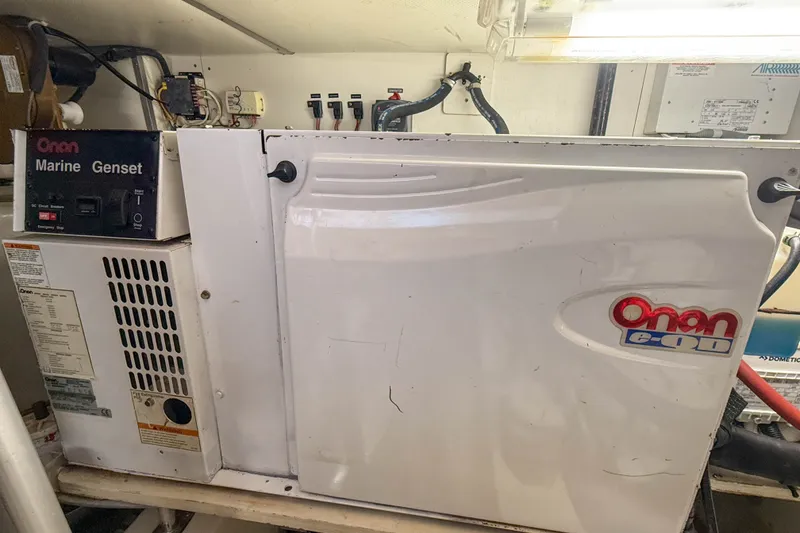 Slide: The Image of Onan Marine Genset in 2008 Grand Banks 45 Eastbay SX engine room. - 56