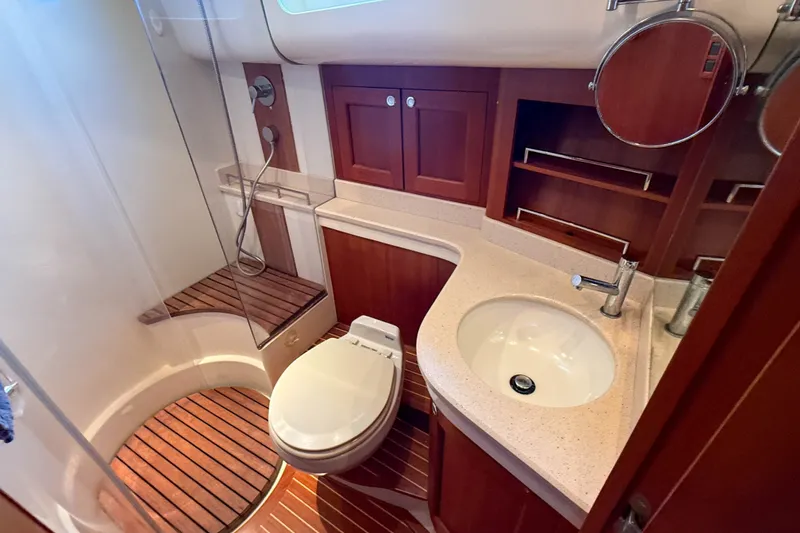 Slide: The Image of Luxurious 2008 Grand Banks 45 Eastbay SX yacht bathroom with wood accents and modern fixtures. - 35