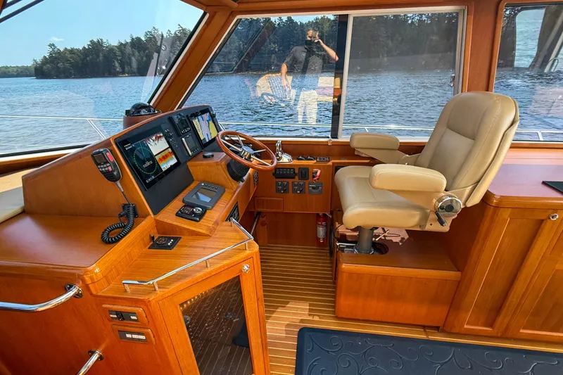 Slide: The Image of Interior of 2008 Grand Banks 45 Eastbay SX yacht with helm and navigation equipment. - 24