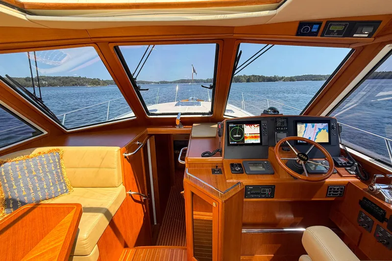 Slide: The Image of Interior view of 2008 Grand Banks 45 Eastbay SX yacht helm with navigation equipment. - 28