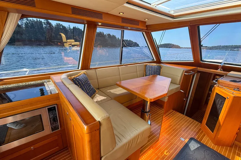 Slide: The Image of Luxurious 2008 Grand Banks 45 Eastbay SX yacht interior with scenic water views. - 18