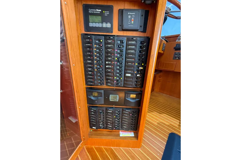 Slide: The Image of Electrical panel of 2008 Grand Banks 45 Eastbay SX yacht with Cummins Onan generator controls. - 29