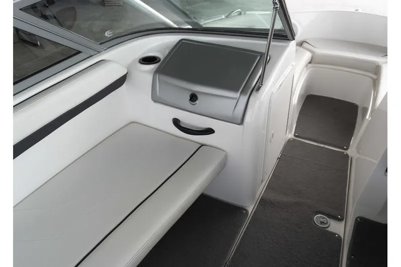 Slide: The Image of Interior of a 2015 Yamaha Boats AR190, featuring seating and storage compartments. - 9