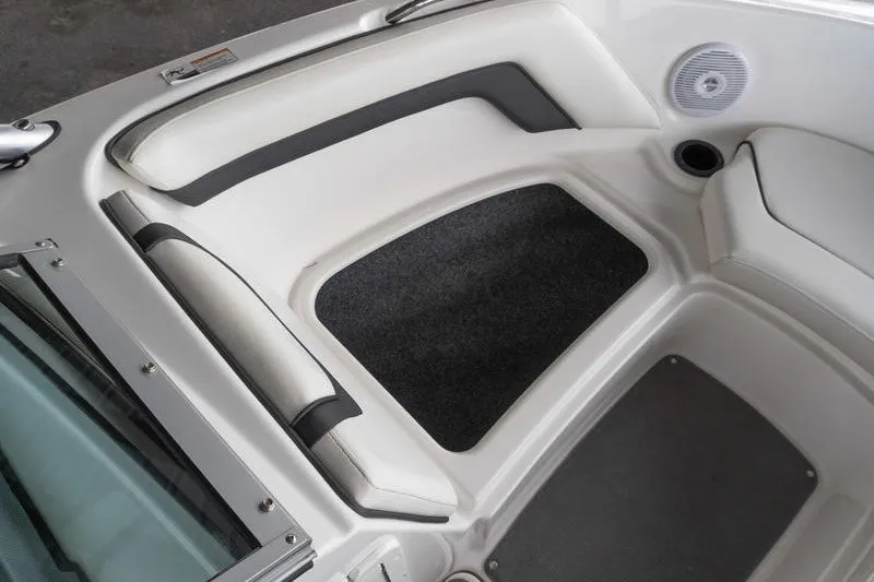 Slide: The Image of 2015 Yamaha Boats AR190 interior seating area with speaker and cup holder. - 13