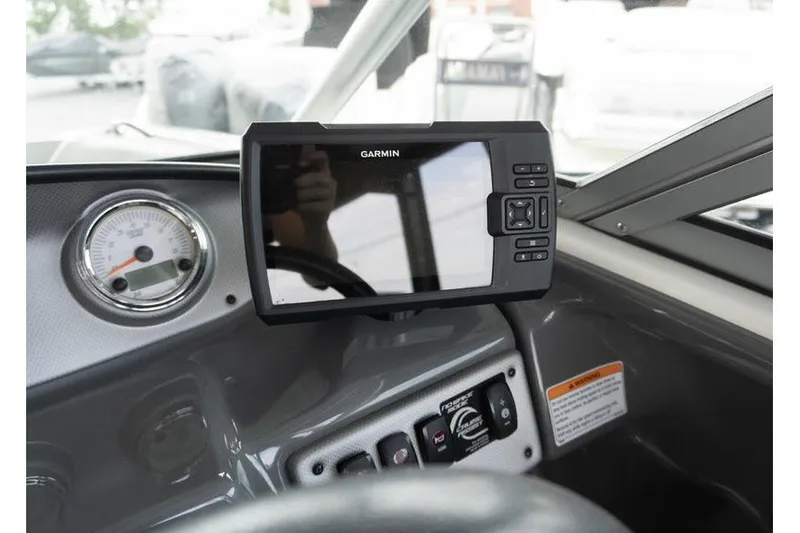 Slide: The Image of Garmin GPS on 2015 Yamaha AR190 boat dashboard with gauge and controls. - 7