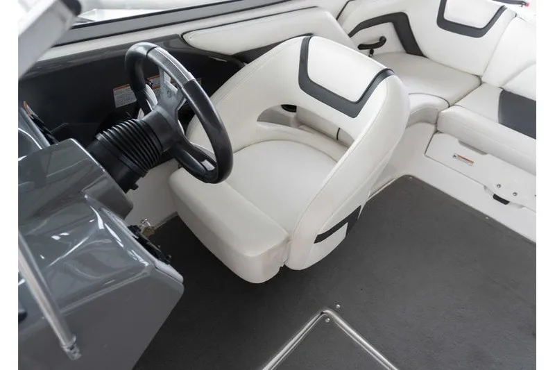 Slide: The Image of 2015 Yamaha Boats AR190 interior with white seating and steering wheel. - 17