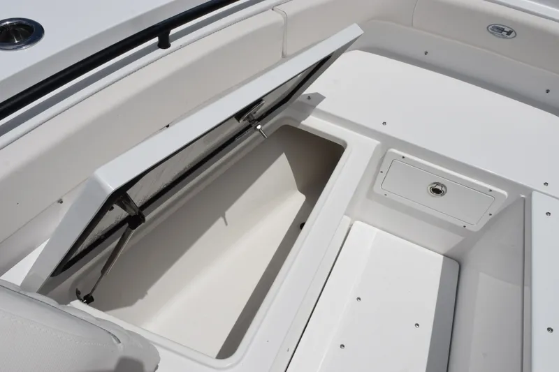 Slide: The Image of 2027 Sea Hunt Gamefish 25 boat storage compartment, open and spacious design. - 13