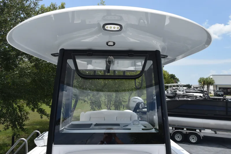 Slide: The Image of 2027 Sea Hunt Gamefish 25 boat with sleek T-top and modern design. - 10