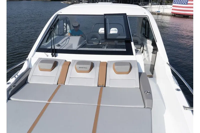 Slide: The Image of 2026 Beneteau Flyer 10 Sport Top boat with spacious deck and modern design on the water. - 24