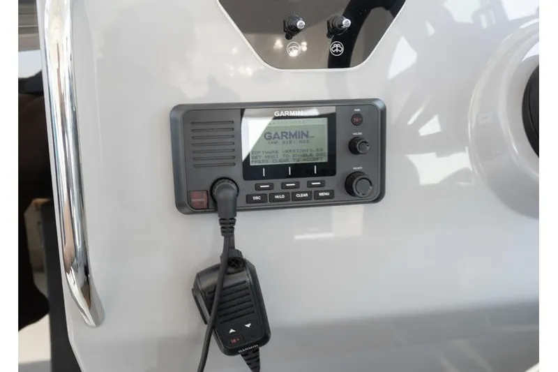 Slide: The Image of Garmin marine radio on 2026 Beneteau Flyer 10 Sport Top dashboard. - 13