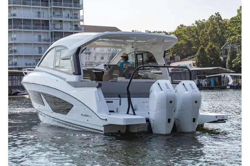 Slide: The Image of 2026 Beneteau Flyer 10 Sport Top boat on water, featuring dual engines and sleek design. - 5