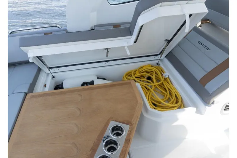 Slide: The Image of 2026 Beneteau Flyer 10 Sport Top interior with storage, seating, and table. - 30