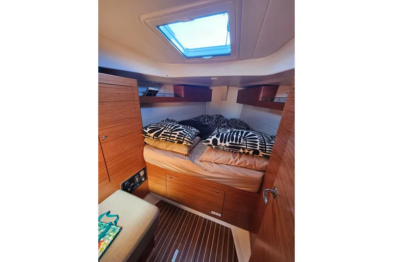 Slide: The Image of Cozy cabin interior of 2015 X-Yachts Xc 38 with wooden finish and skylight. - 13