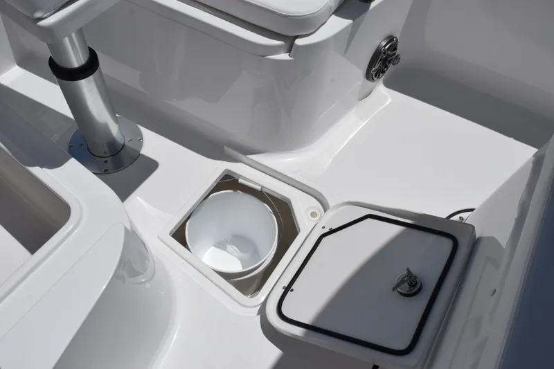 Slide: The Image of 2027 Sea Hunt Gamefish 30FS boat interior with storage compartments and seating. - 21