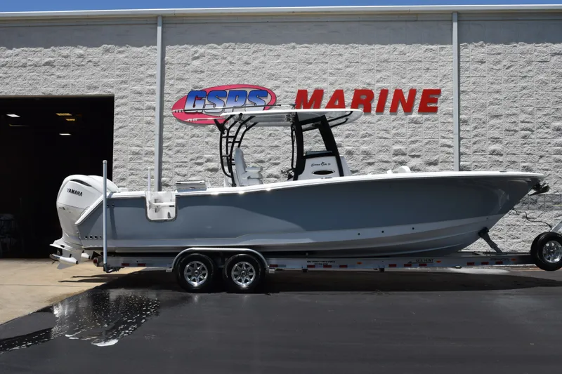 The Image of 2027 Sea Hunt Gamefish 30FS boat on trailer at GSPS Marine dealership. - 1