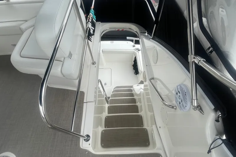Slide: The Image of 2006 Silverton 34 Convertible yacht interior with stairs and seating area. - 27