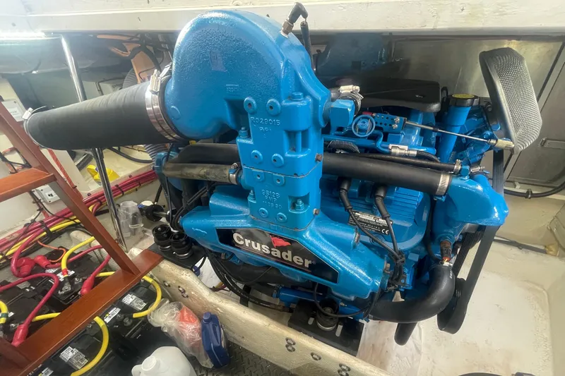 Slide: The Image of Engine room of 2006 Silverton 34 Convertible with blue Crusader engine. - 67