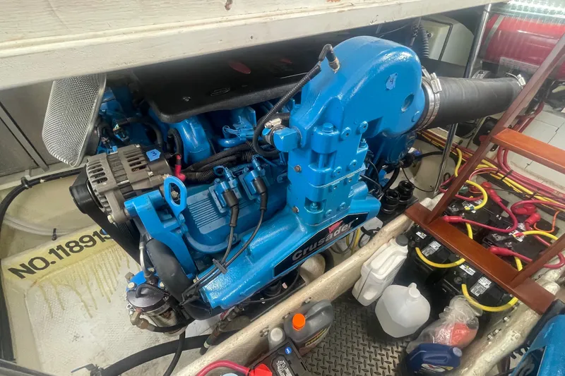 Slide: The Image of Engine compartment of a 2006 Silverton 34 Convertible boat with Crusader engine. - 68