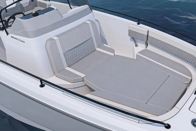 Slide: The Image of Manufacturer Provided Image: 2026 Beneteau Flyer 8 SPACEdeck boat interior with cushioned seating and sleek design. - 6