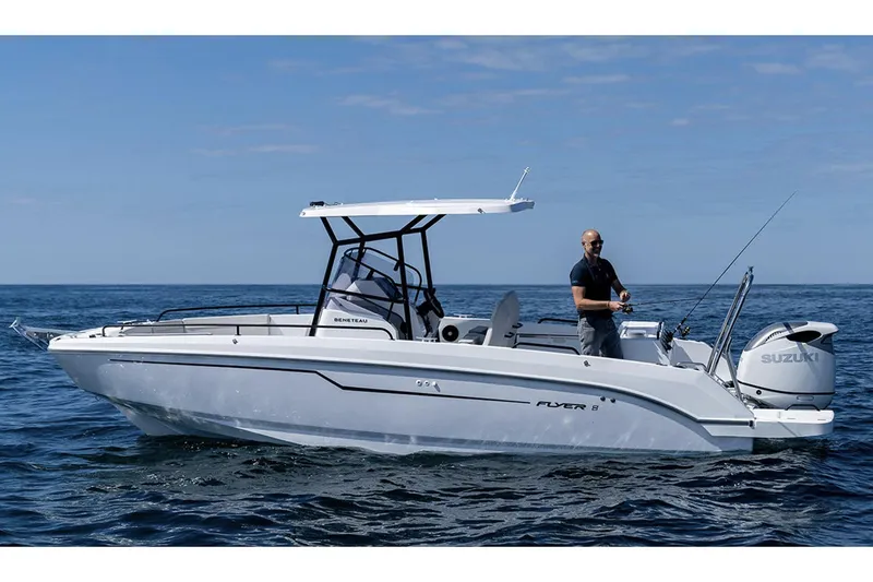 Slide: The Image of Manufacturer Provided Image: 2026 Beneteau Flyer 8 SPACEdeck boat on open water, featuring a Suzuki outboard motor. - 1