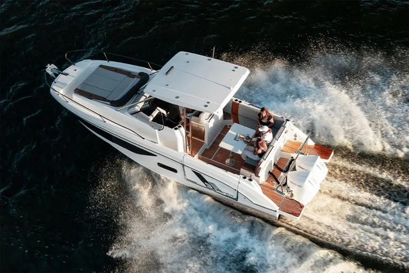 Slide: The Image of Manufacturer Provided Image: 2026 Beneteau Flyer 9 SUNdeck cruising on water, aerial view. - 0