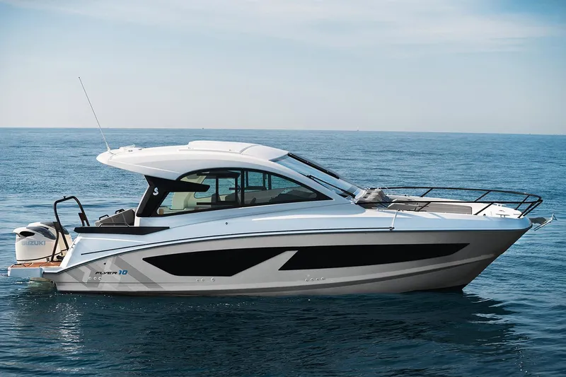 Slide: The Image of Manufacturer Provided Image: 2026 Beneteau Flyer 10 Sport Top boat on calm ocean waters. - 1