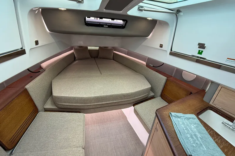 Slide: The Image of Luxurious interior of 2023 Axopar 45 XC Cross Cabin with spacious seating and modern design. - 29