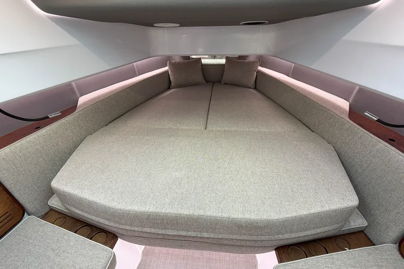 Slide: The Image of Interior cabin view of 2023 Axopar 45 XC Cross Cabin with comfortable bedding. - 30