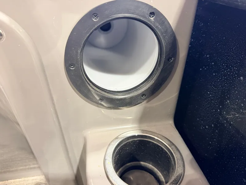 Slide: The Image of Close-up of two round stainless steel fittings on a boat. - 30