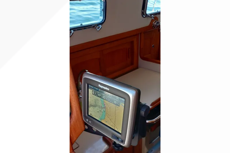 Slide: The Image of Navigation system inside a 2002 Pacific Seacraft Dana 24 sailboat cabin. - 13