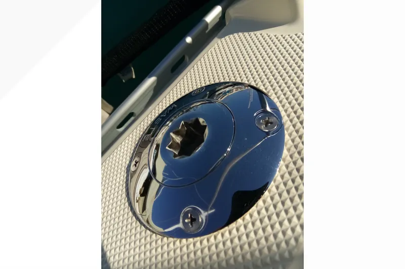 Slide: The Image of Close-up of a polished metal fitting on a 2002 Pacific Seacraft Dana 24 sailboat. - 40