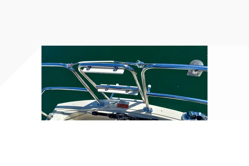 Slide: The Image of Bow view of 2002 Pacific Seacraft Dana 24 sailboat with stainless steel railings. - 18