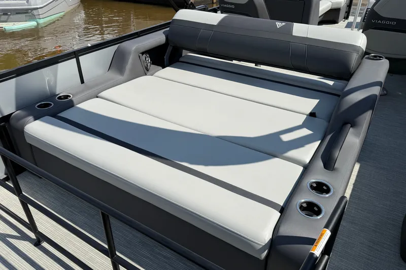 Slide: The Image of Luxurious seating area on 2026 Viaggio X24 boat with cup holders and sleek design. - 10