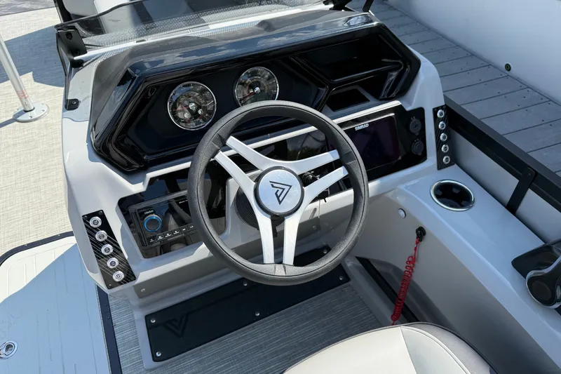 Slide: The Image of Steering console of 2026 Viaggio X24 boat with modern controls and dashboard. - 7