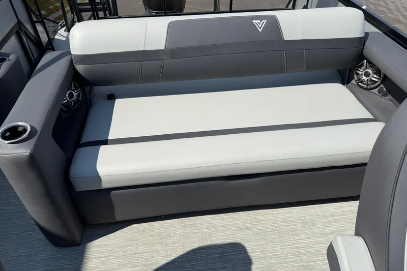 Slide: The Image of 2026 Viaggio X24 boat interior with sleek gray seating and integrated speakers. - 9