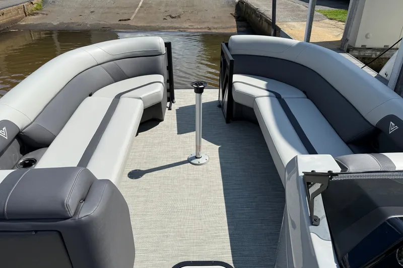 Slide: The Image of Luxurious 2026 Viaggio X24 pontoon boat interior with sleek gray seating and modern design. - 6