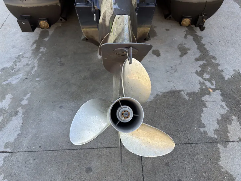 Slide: The Image of Close-up of a boat propeller on a concrete surface. - 28
