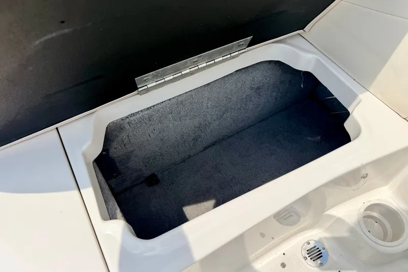Slide: The Image of Storage compartment in a 2005 Starcraft 2100 IO RE Limited boat. - 40