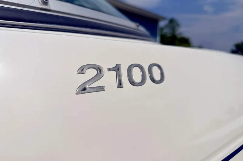 Slide: The Image of Close-up of 2005 Starcraft 2100 IO RE Limited boat model number. - 13
