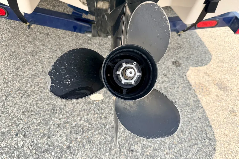 Slide: The Image of Propeller of a 2005 Starcraft 2100 IO RE Limited boat on a trailer. - 21