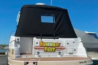 Slide: The Image of 2013 Four Winns V335 boat with "Summer Fest" sign, docked in Erie, PA. - 4
