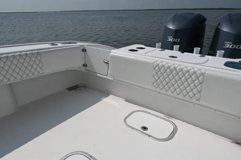 Slide: The Image of 2015 Cape Horn 31T boat interior with Yamaha 300 engines, featuring spacious deck and seating. - 25