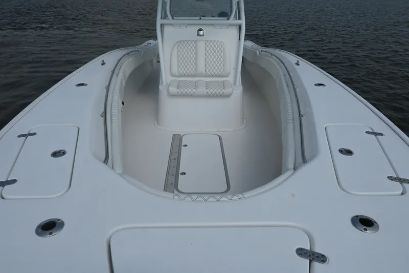 Slide: The Image of 2015 Cape Horn 31T boat deck with seating, on calm water. - 13
