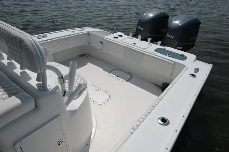 Slide: The Image of 2015 Cape Horn 31T boat with dual Yamaha 300 engines on open water. - 24