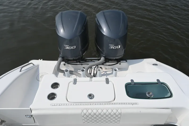 Slide: The Image of 2015 Cape Horn 31T boat with dual Yamaha 300 engines on water. - 27