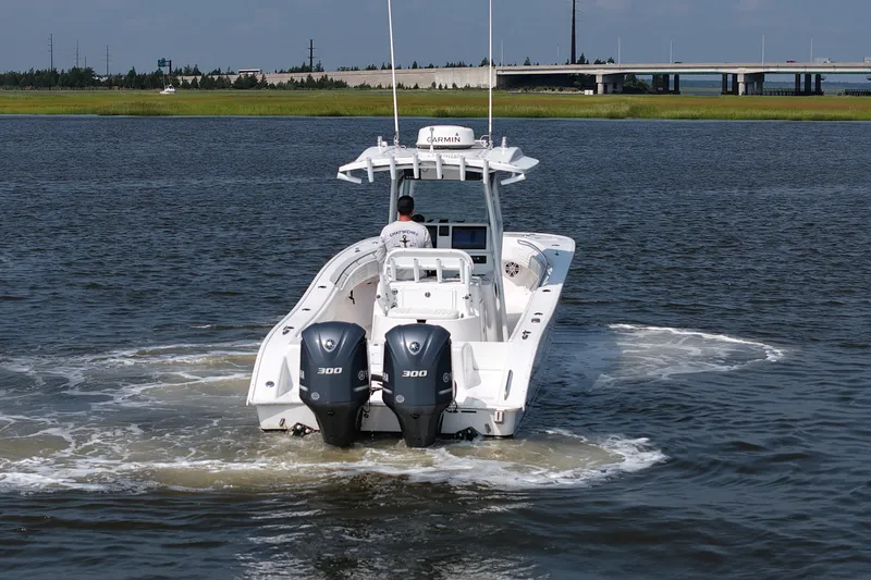 Slide: The Image of 2015 Cape Horn 31T boat with dual engines cruising on open water. - 6
